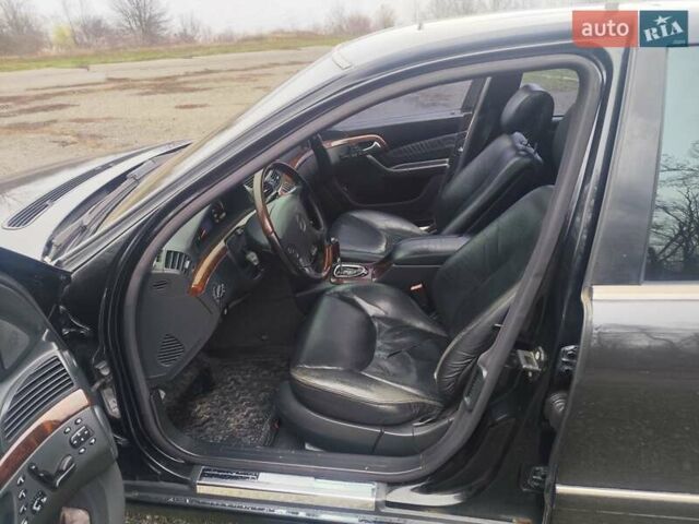 Черный Мерседес С Класс, объемом двигателя 5 л и пробегом 477 тыс. км за 4000 $, фото 9 на Automoto.ua