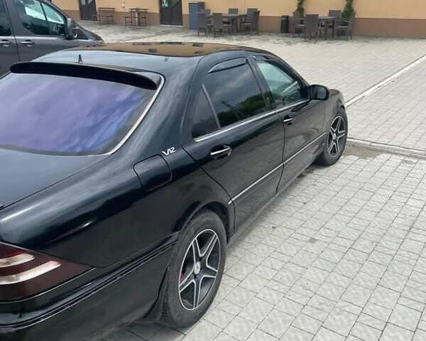 Чорний Мерседес С Клас, об'ємом двигуна 5.51 л та пробігом 250 тис. км за 2700 $, фото 4 на Automoto.ua