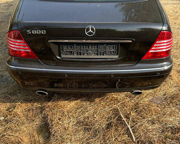 Чорний Мерседес С Клас, об'ємом двигуна 5.79 л та пробігом 153 тис. км за 16999 $, фото 9 на Automoto.ua