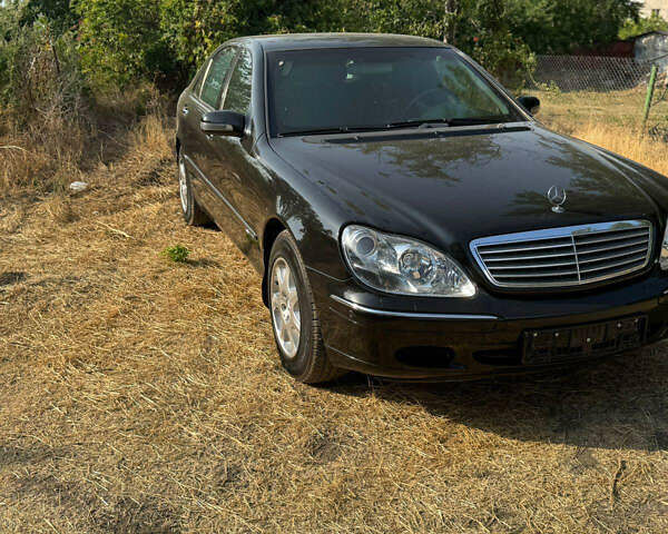 Чорний Мерседес С Клас, об'ємом двигуна 5.79 л та пробігом 153 тис. км за 16999 $, фото 1 на Automoto.ua