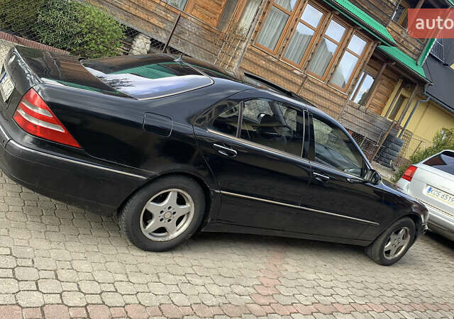 Чорний Мерседес С Клас, об'ємом двигуна 4 л та пробігом 290 тис. км за 2000 $, фото 1 на Automoto.ua