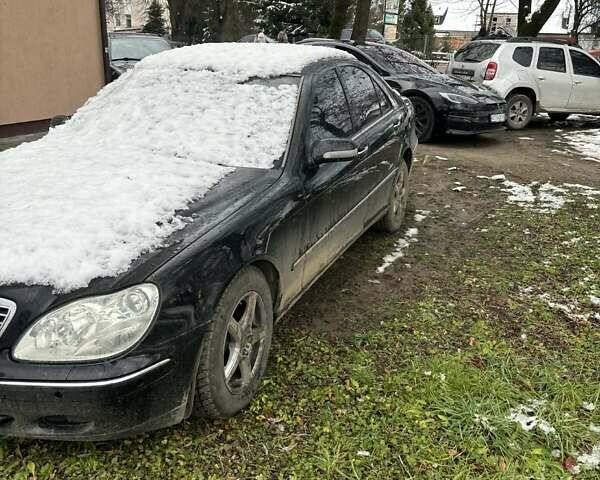 Чорний Мерседес С Клас, об'ємом двигуна 4 л та пробігом 300 тис. км за 3800 $, фото 1 на Automoto.ua