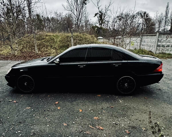 Черный Мерседес С Класс, объемом двигателя 4.97 л и пробегом 266 тыс. км за 9500 $, фото 4 на Automoto.ua