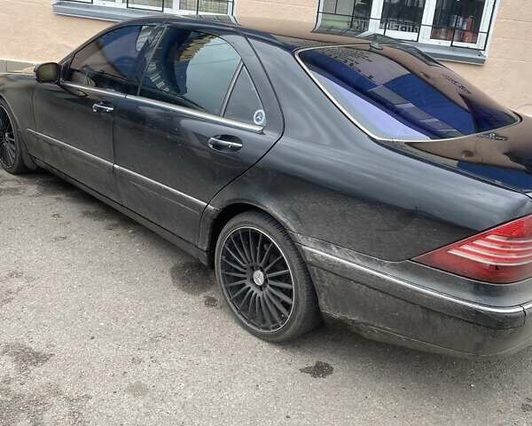 Черный Мерседес С Класс, объемом двигателя 4.97 л и пробегом 350 тыс. км за 3500 $, фото 8 на Automoto.ua