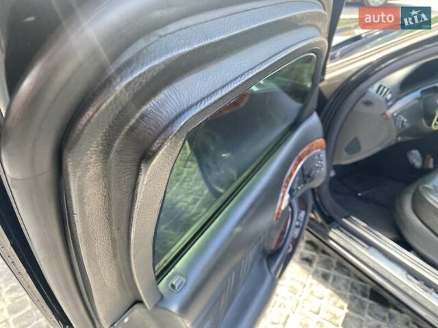 Чорний Мерседес С Клас, об'ємом двигуна 5.51 л та пробігом 114 тис. км за 29999 $, фото 3 на Automoto.ua