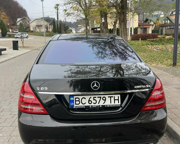 Черный Мерседес С Класс, объемом двигателя 5.51 л и пробегом 189 тыс. км за 12000 $, фото 2 на Automoto.ua