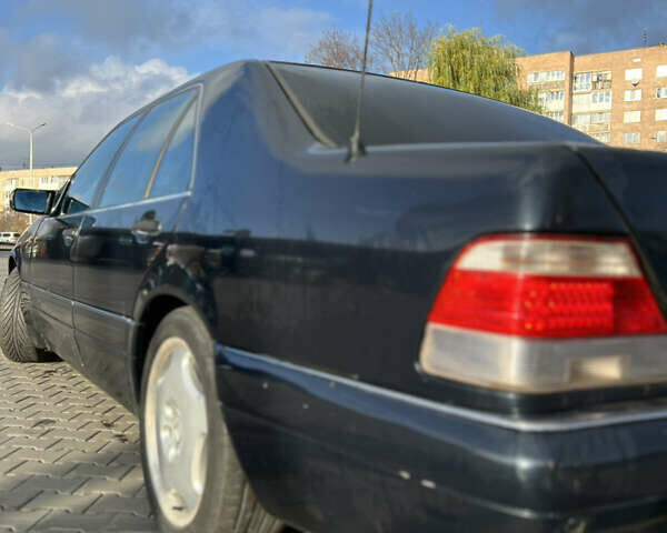 Синий Мерседес С Класс, объемом двигателя 4.97 л и пробегом 300 тыс. км за 8777 $, фото 5 на Automoto.ua