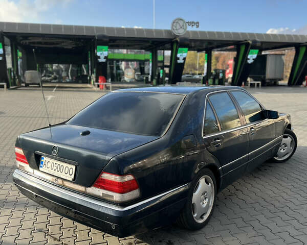 Синий Мерседес С Класс, объемом двигателя 4.97 л и пробегом 300 тыс. км за 8777 $, фото 1 на Automoto.ua