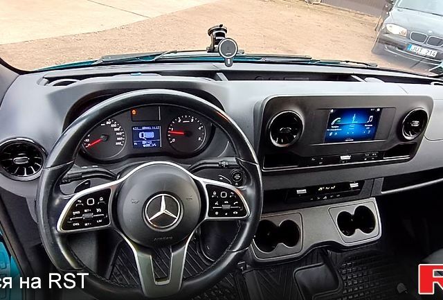 Синий Мерседес Sprinter, объемом двигателя 2.1 л и пробегом 237 тыс. км за 28000 $, фото 4 на Automoto.ua