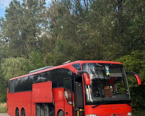 Красный Мерседес Туризмо, объемом двигателя 11.97 л и пробегом 540 тыс. км за 104999 $, фото 1 на Automoto.ua