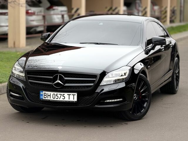 Черный Мерседес CLS серия, объемом двигателя 3 л и пробегом 133 тыс. км за 20900 $, фото 1 на Automoto.ua