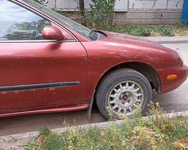 Червоний Меркурі Mystique, об'ємом двигуна 3 л та пробігом 320 тис. км за 1500 $, фото 1 на Automoto.ua