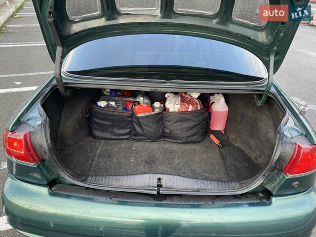 Зелений Меркурі Mystique, об'ємом двигуна 1.99 л та пробігом 274 тис. км за 3100 $, фото 10 на Automoto.ua
