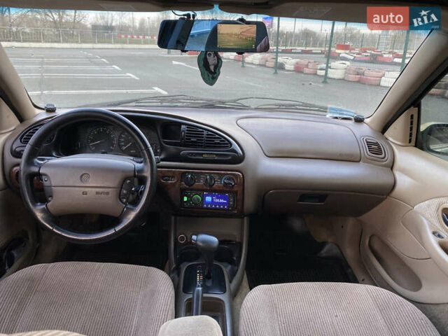 Зелений Меркурі Mystique, об'ємом двигуна 1.99 л та пробігом 274 тис. км за 3100 $, фото 8 на Automoto.ua