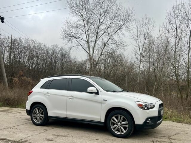 Білий Міцубісі АСХ, об'ємом двигуна 2 л та пробігом 220 тис. км за 10900 $, фото 1 на Automoto.ua