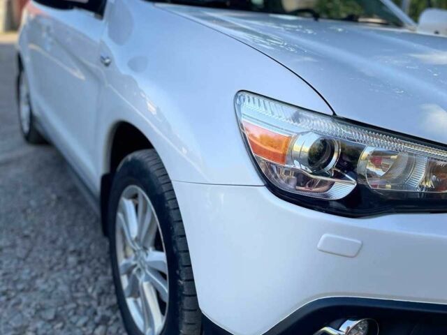 Білий Міцубісі АСХ, об'ємом двигуна 2 л та пробігом 170 тис. км за 9900 $, фото 5 на Automoto.ua