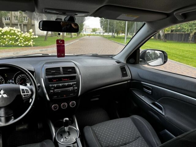 Белый Мицубиси АСХ, объемом двигателя 1.8 л и пробегом 206 тыс. км за 8800 $, фото 15 на Automoto.ua