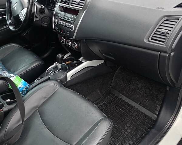 Белый Мицубиси АСХ, объемом двигателя 2 л и пробегом 163 тыс. км за 11700 $, фото 15 на Automoto.ua