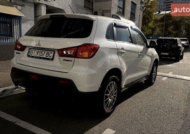Белый Мицубиси АСХ, объемом двигателя 1.6 л и пробегом 165 тыс. км за 8700 $, фото 6 на Automoto.ua