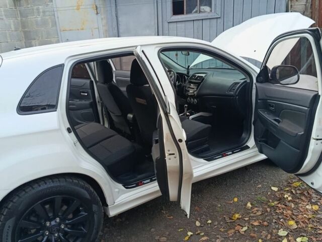 Белый Мицубиси АСХ, объемом двигателя 2 л и пробегом 171 тыс. км за 11539 $, фото 20 на Automoto.ua