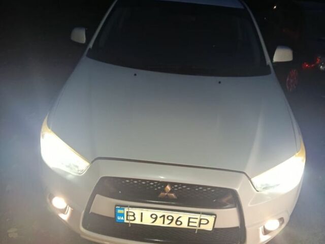 Белый Мицубиси АСХ, объемом двигателя 2 л и пробегом 171 тыс. км за 11539 $, фото 5 на Automoto.ua