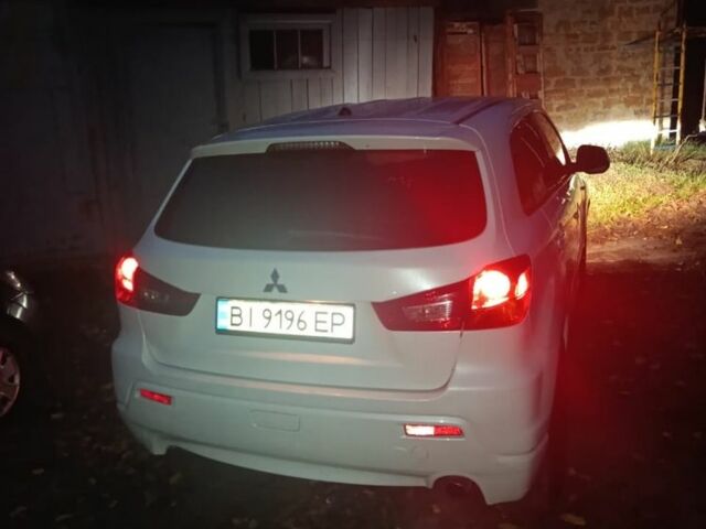 Белый Мицубиси АСХ, объемом двигателя 2 л и пробегом 171 тыс. км за 11539 $, фото 4 на Automoto.ua