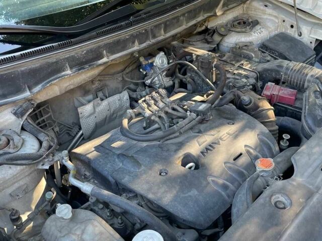 Білий Міцубісі АСХ, об'ємом двигуна 2 л та пробігом 170 тис. км за 9900 $, фото 10 на Automoto.ua