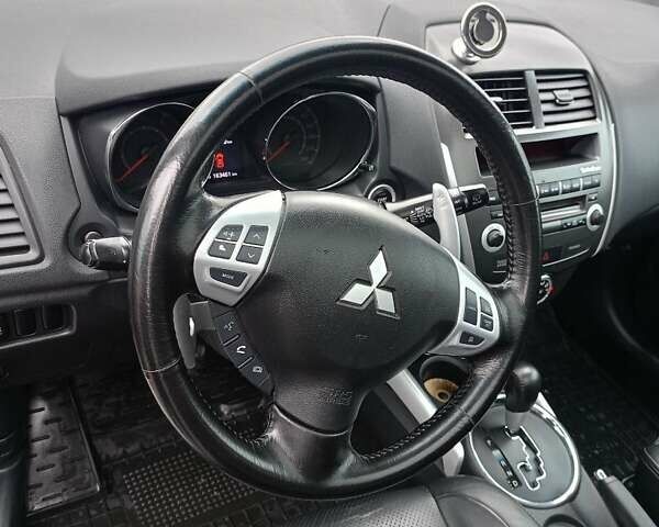 Белый Мицубиси АСХ, объемом двигателя 2 л и пробегом 163 тыс. км за 11700 $, фото 16 на Automoto.ua