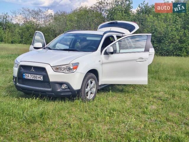 Белый Мицубиси АСХ, объемом двигателя 1.59 л и пробегом 252 тыс. км за 9500 $, фото 17 на Automoto.ua