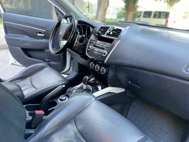 Білий Міцубісі АСХ, об'ємом двигуна 2 л та пробігом 170 тис. км за 9900 $, фото 20 на Automoto.ua