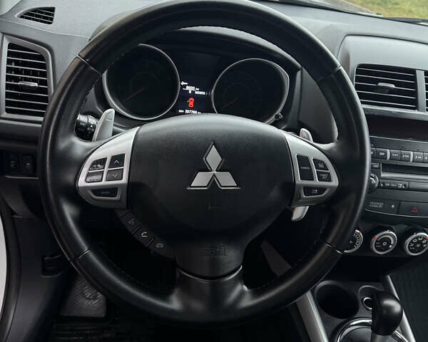 Білий Міцубісі АСХ, об'ємом двигуна 1.8 л та пробігом 208 тис. км за 8900 $, фото 21 на Automoto.ua