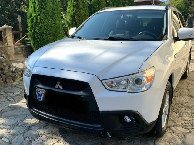 Белый Мицубиси АСХ, объемом двигателя 1.8 л и пробегом 150 тыс. км за 9700 $, фото 7 на Automoto.ua