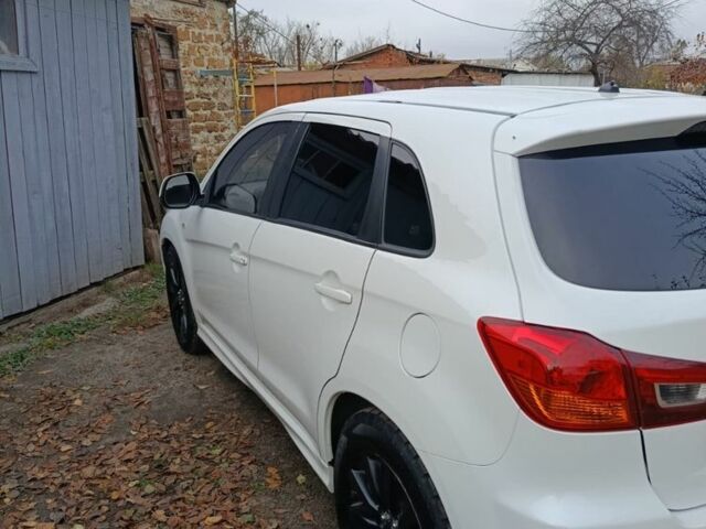 Белый Мицубиси АСХ, объемом двигателя 2 л и пробегом 171 тыс. км за 11539 $, фото 18 на Automoto.ua
