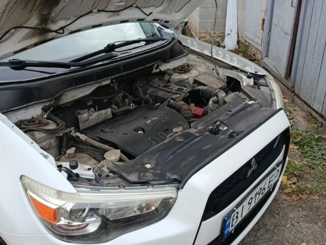 Белый Мицубиси АСХ, объемом двигателя 2 л и пробегом 171 тыс. км за 11539 $, фото 16 на Automoto.ua