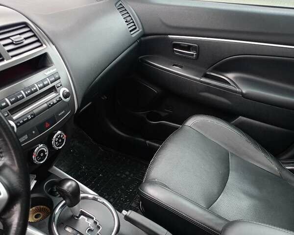 Белый Мицубиси АСХ, объемом двигателя 2 л и пробегом 163 тыс. км за 11700 $, фото 2 на Automoto.ua