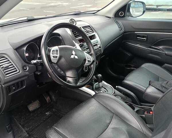 Белый Мицубиси АСХ, объемом двигателя 2 л и пробегом 163 тыс. км за 11700 $, фото 8 на Automoto.ua