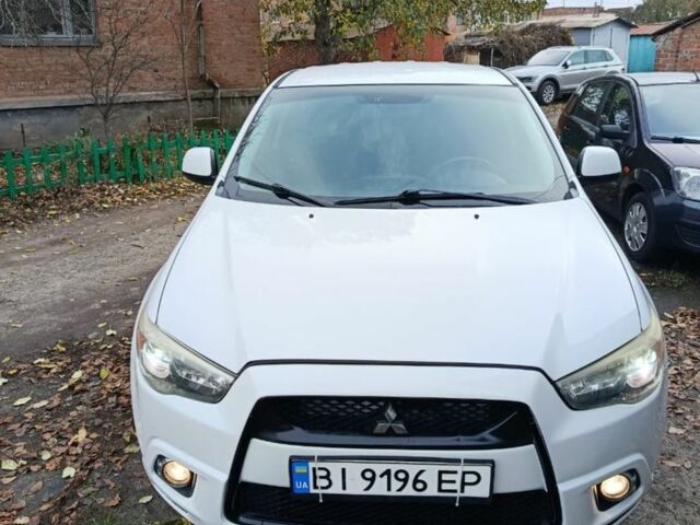 Белый Мицубиси АСХ, объемом двигателя 2 л и пробегом 171 тыс. км за 11539 $, фото 3 на Automoto.ua
