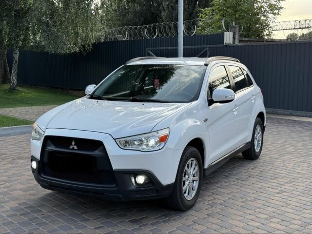 Белый Мицубиси АСХ, объемом двигателя 1.8 л и пробегом 206 тыс. км за 8800 $, фото 6 на Automoto.ua