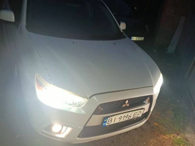 Белый Мицубиси АСХ, объемом двигателя 2 л и пробегом 171 тыс. км за 11539 $, фото 6 на Automoto.ua