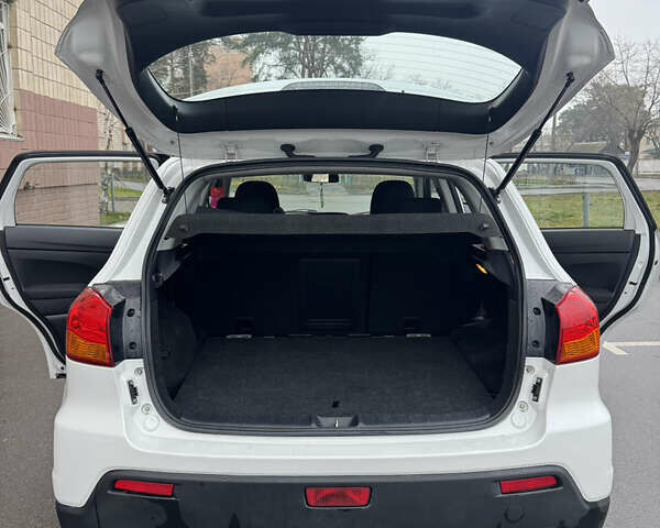 Белый Мицубиси АСХ, объемом двигателя 1.8 л и пробегом 207 тыс. км за 8700 $, фото 30 на Automoto.ua