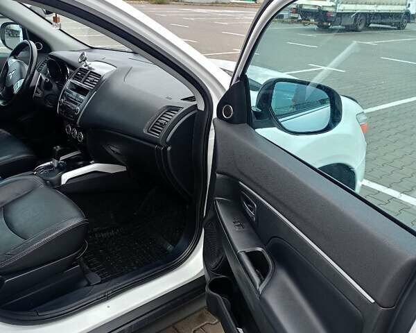 Белый Мицубиси АСХ, объемом двигателя 2 л и пробегом 163 тыс. км за 11700 $, фото 10 на Automoto.ua