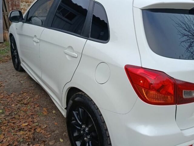 Белый Мицубиси АСХ, объемом двигателя 2 л и пробегом 171 тыс. км за 11539 $, фото 9 на Automoto.ua