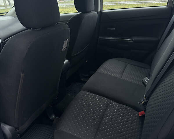 Белый Мицубиси АСХ, объемом двигателя 1.8 л и пробегом 207 тыс. км за 8700 $, фото 23 на Automoto.ua