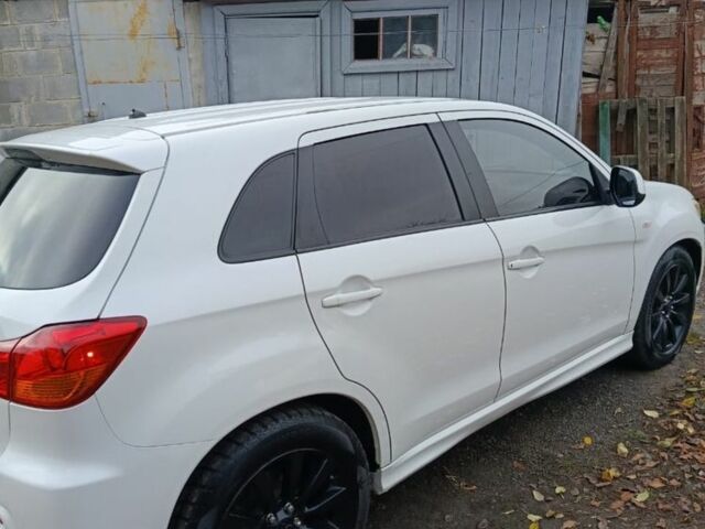 Белый Мицубиси АСХ, объемом двигателя 2 л и пробегом 171 тыс. км за 11539 $, фото 2 на Automoto.ua