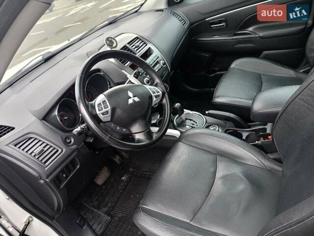 Белый Мицубиси АСХ, объемом двигателя 2 л и пробегом 163 тыс. км за 11700 $, фото 13 на Automoto.ua