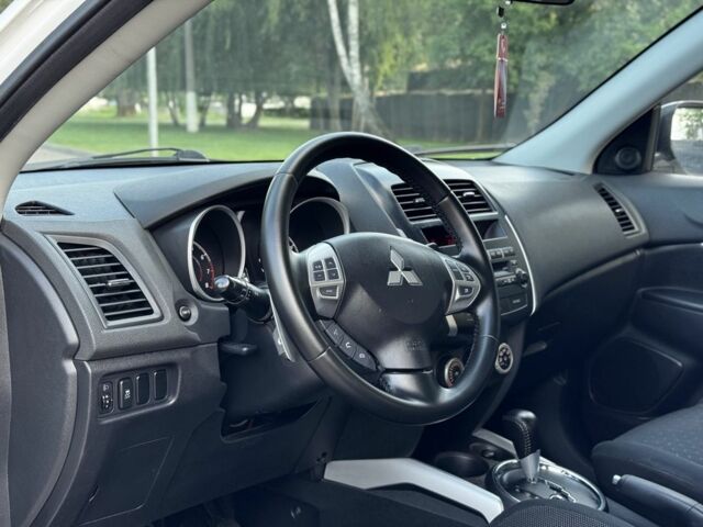 Белый Мицубиси АСХ, объемом двигателя 1.8 л и пробегом 206 тыс. км за 8800 $, фото 7 на Automoto.ua