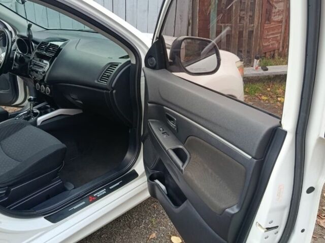 Белый Мицубиси АСХ, объемом двигателя 2 л и пробегом 171 тыс. км за 11539 $, фото 14 на Automoto.ua