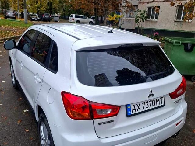 Белый Мицубиси АСХ, объемом двигателя 2 л и пробегом 115 тыс. км за 9800 $, фото 3 на Automoto.ua