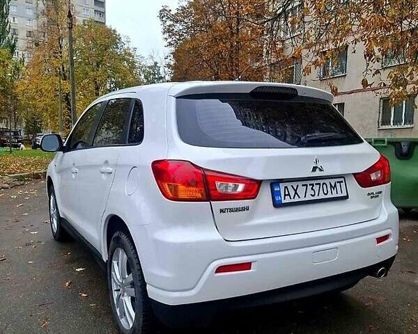 Белый Мицубиси АСХ, объемом двигателя 2 л и пробегом 115 тыс. км за 9800 $, фото 5 на Automoto.ua