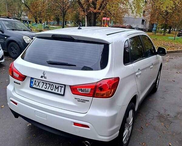Белый Мицубиси АСХ, объемом двигателя 2 л и пробегом 115 тыс. км за 9800 $, фото 9 на Automoto.ua